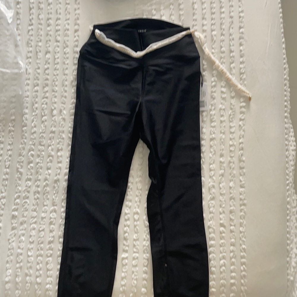 WeWoreWhat black pants with gold belt